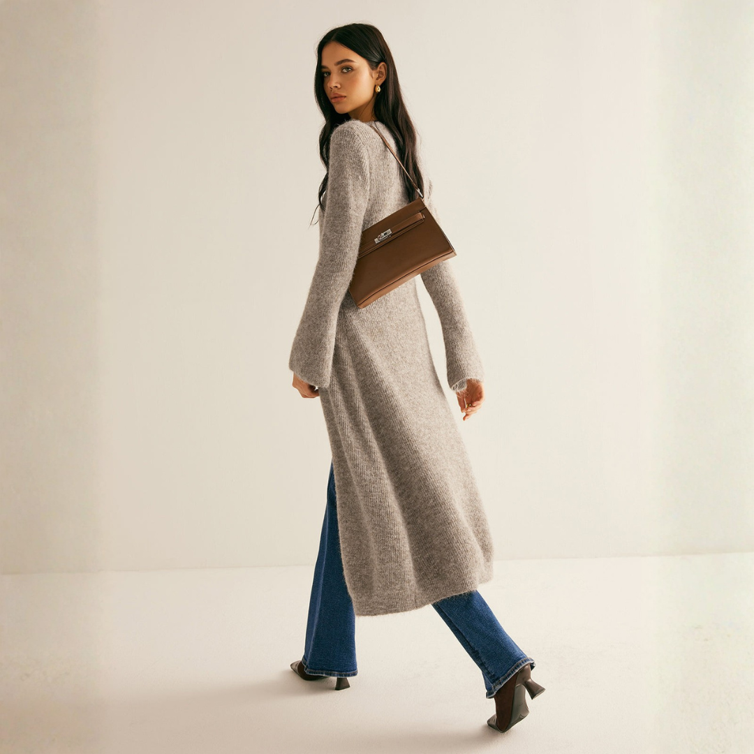 Back view of floor-skimming heather gray ribbed knit cardigan with flare sleeves