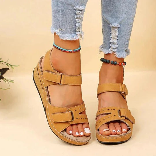 Tan buckle-strap wedge platform sandals for women with open toe design