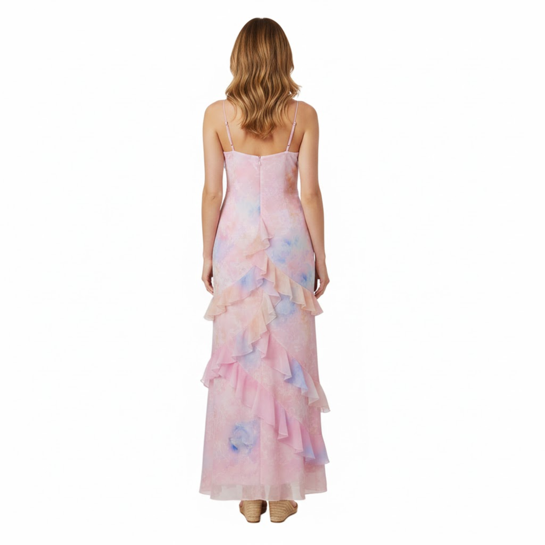 Back view of women's floral maxi dress showing zipper closure and cascading ruffles