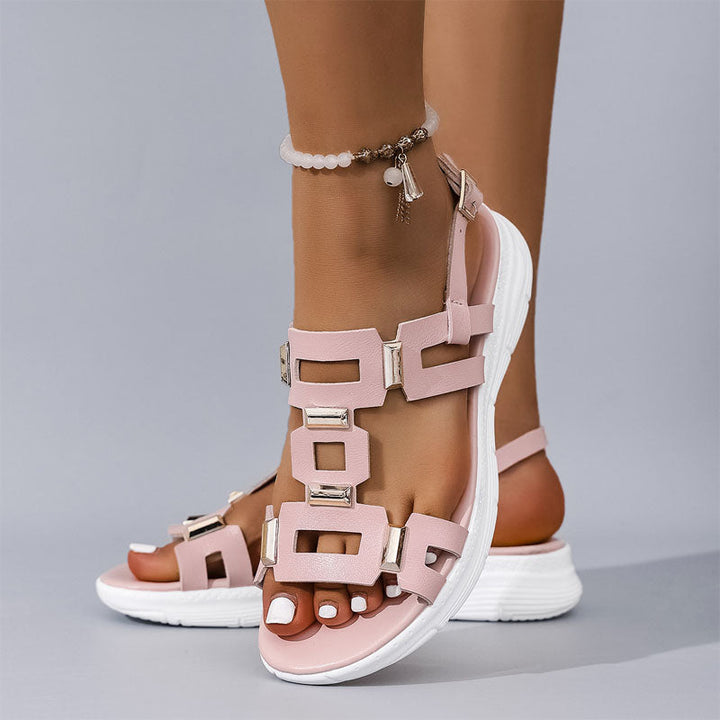Pink women's geometric buckle flat sandals with open toe and cushioned sole