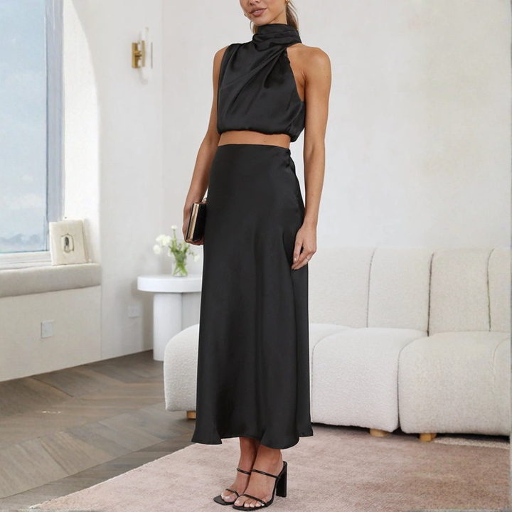 black satin halter neck crop top and high waist maxi skirt outfit