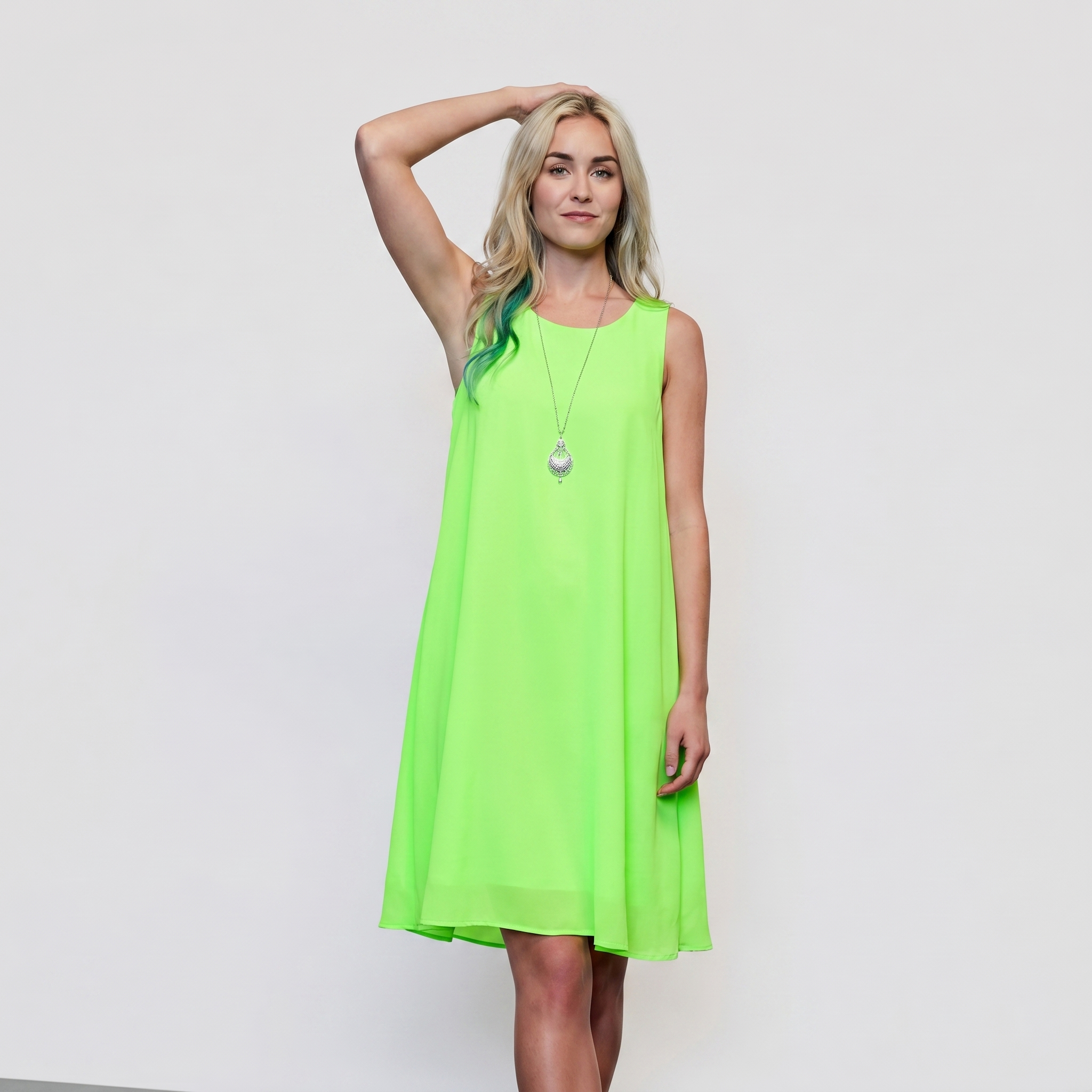 Neon green women's sleeveless A-line mini dress with airy fabric and relaxed fit